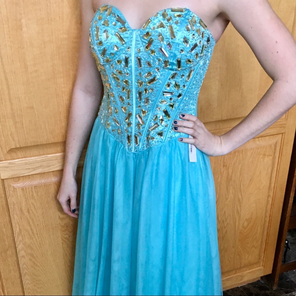 Women’s sky blue gemmed prom dress